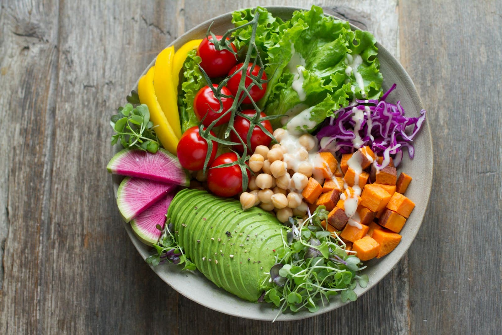 A fresh, colorful grain bowl with seasonal vegetables
